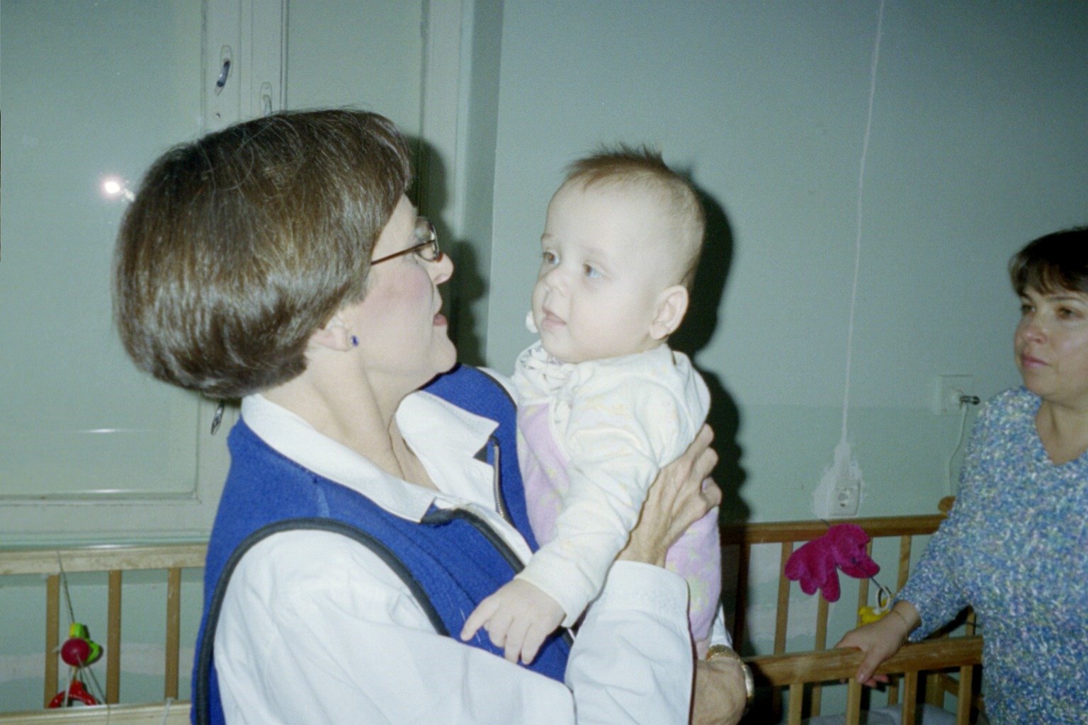 Judy Tinney with infant girl in Brovary